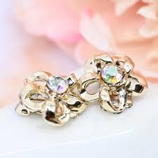 1950's MCM Button Style Clip on Earrings, Gold Tone Openwork Petals W Flashy Aurora Borealis Prong Set Crystals, Excellent VTG Used Cond. - Etsy