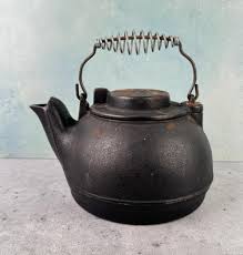 Sold at Auction: Wagner Cast Iron Tea Kettle