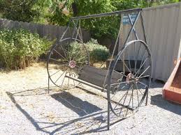 Lot #12 - Large Wagon Wheel Bench Swing - NorCal Online ...
