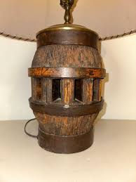 WAGON WHEEL HUB TABLE LAMP W/LEATHER SHADE | EstateSales.org