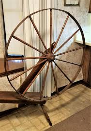 Lot #293 Antique Spinning Wheel - 13 spokes | EstateSales.org