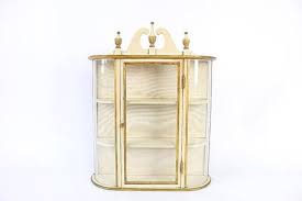 Stick & Ball Curved Glass Wall Curio Cabinet