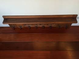 Antique Hand Carved Gothic Revival Coat Rack with Hand Forged Wrought Iron Hooks at 1stDibs | gothic coat hanger, gothic coat rack, gots of the iron hand