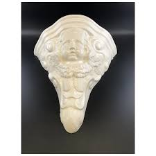 Wall lamp console with putti ange decor in ceramic of French Gien. For Sale at Ruby Lane
