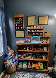 Vintage dinosaur and car themed bedroom