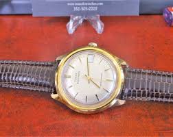 Vintage Timex Gold Tone Automatic Water Resistant Mens Watch ...