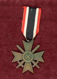 Sold at Auction: GERMAN WAR MERIT CROSS WITH SWORDS WITH AWARD CERTIFICATE