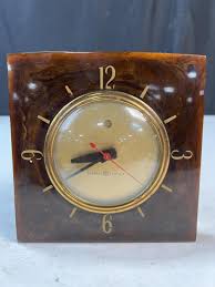 Sold at Auction: General Electric Model 3H178 minimalist Bakelite clock, cut cable,