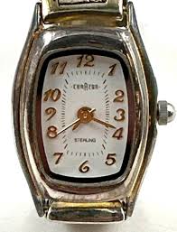 Sold at Auction: CorAzon Sterling Silver 14K Gold Bangle Watch