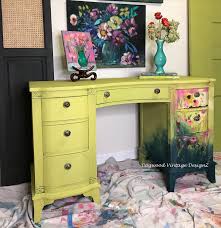 It's available and ready to ship to you! Vintage solid wood desk/vanity. Restored and painted in a chartreuse with hand painted flowers. Look at those pretty drawer pulls 😉 . I have