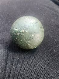 I found this small heavy rock on the beach I'm Port Angeles ...