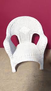 Sold at Auction: Wicker chair & table & (1) plastic wicker chair