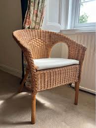 Wicker chair and footstool set