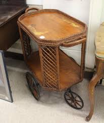 Lot - OAK AND WICKER TEA CART
