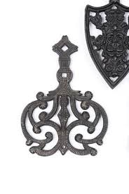 Lot - CAST IRON TRIVETS