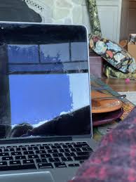 I got a used MacBook from and the screen has this big blotch ...