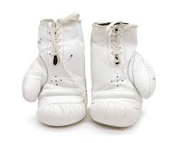 Sold at Auction: A pair of signed Lonsdale boxing gloves