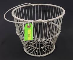 Sold at Auction: VINTAGE WIRE METAL EGG BASKET