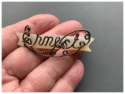 Vintage Mother of pearl wire name ERNEST pin- unusual. For Sale at Ruby Lane