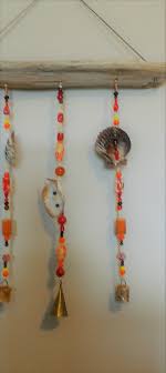 Sun Catcher-windchime With Lion's Paw Shells - Etsy