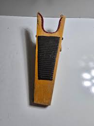 Schmidt work wear boots and wooden boot Jack | EstateSales.org