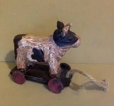 Vintage Pull Toy. Cow with Horns on a Wagon. Painted Wood ...