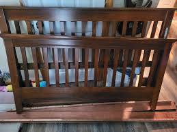 Pending** Free queen sized bed frame, pickup only. Will ...