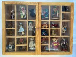 Sold at Auction: Showcase Filled With Miniature Teddy Bears