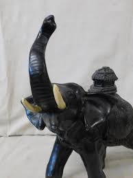 Lot - Sculptured Metal Elephant