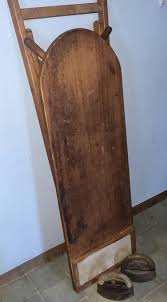 Sold at Auction: Wooden Ironing Board with 2 Sad Irons and ...