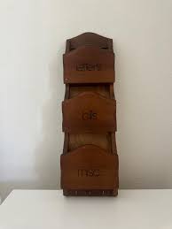 BRANDED LETTER RACK. Vintage wooden wall | Mercari