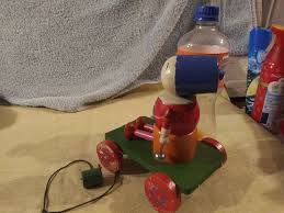 Antique wood pull toy her head turns, her feet go up & down ...