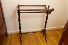 Sold at Auction: Quilt Rack and Old Quilt