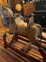 Identify antique rocking horse age and maker?