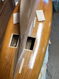 Repair and rigging of a Marblehead model sailing boat