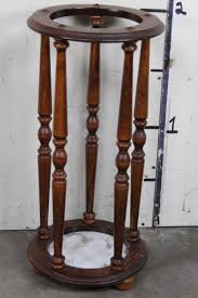 Sold at Auction: Wooden CANE/UMBRELLA HOLDER STAND. By ...