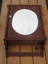 Vintage French Wall Medicine Cabinet Apothecary Glass Oval mirror carved Wood - Collectors in the House