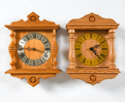 Sold at Auction: (2) SWEDISH PINE WALL CLOCKS