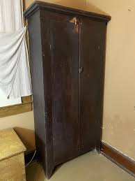 Sold at Auction: Tall Plank Door Pantry Cupboard/ Linen Press in Old Paint, 37 x 16 x 72 1/2 in. (94 x 40.6 x 184.2 cm.)