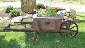 Old Fashioned Reproduction Wood and Metal Spoke Wheelbarrows