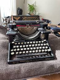 I want to clean this. It has a lot of dust on it. What is the best way to do it and can you tell me anything about this particular typewriter? :