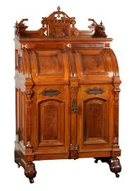 Sold at Auction: WOOTON DESK CO. INDIANAPOLIS, IND. PAT. OCT. 6. 1874. A FINE LATE 19TH CENTURY WALNUT AND BURR MAPLE PANELLED WOOTON DESK