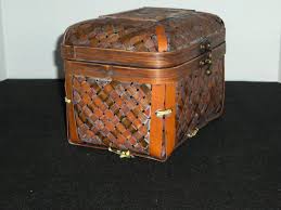 Decorative Woven Ratten Basket Shimmers With Copper Gilt ...