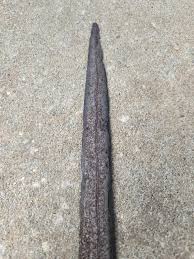 Does anybody know Keris blades? I think this it is a Cirebon Kris. I just can tell if it's really old or just a cheap knock off. The elephant grip had so