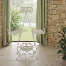 Benjara Shin Classic White Metal with 4-Drainable Pots Plant Stand (9.45 in. x W 32.68 in. H) BM330118 - The Home Depot