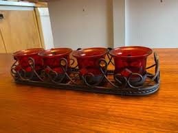 Se produkter som liknar Ljusstake för fyra ljus på Tradera ...