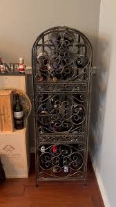 Watch My Opinion of This Wrought Iron Wine Storage Cabinet ...