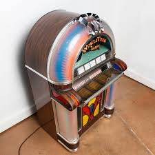 Sold at Auction: WURLITZER JUKEBOX, MODEL 1050
