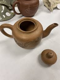 Sold at auction Eleven Yixing Teapots Auction Number 3551T Lot Number 1020 | Skinner Auctioneers