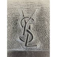 Belle de jour patent leather clutch bag Yves Saint Laurent ...